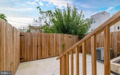 a view of a wooden fence