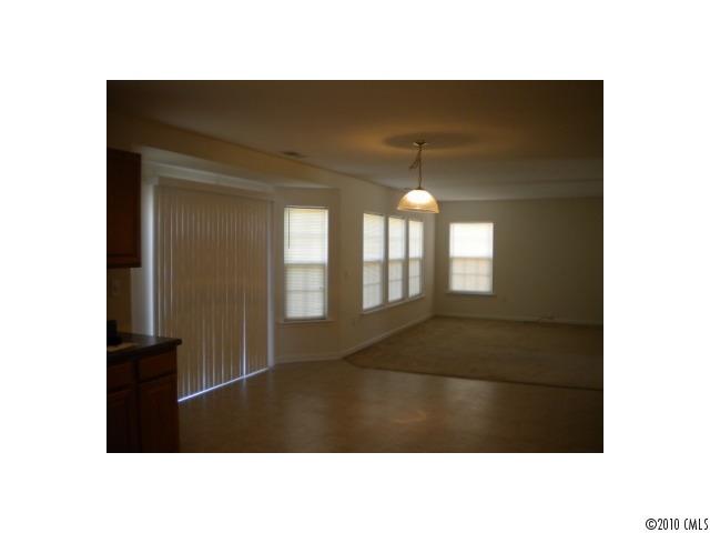 7809 Kuck Road Mint Hill, NC 28227 - Photo 4 of 10 a black and white photo of a living room