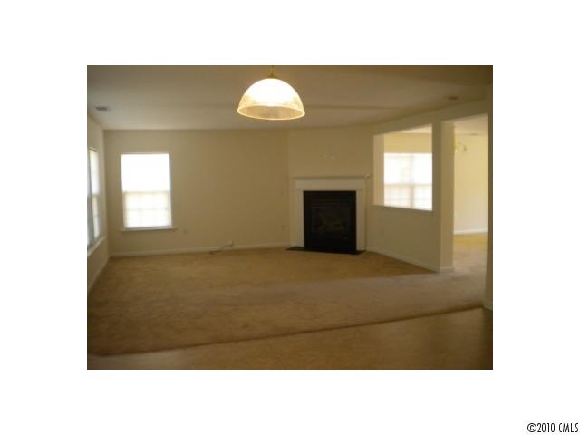 7809 Kuck Road Mint Hill, NC 28227 - Photo 5 of 10 a black and white photo of a living room