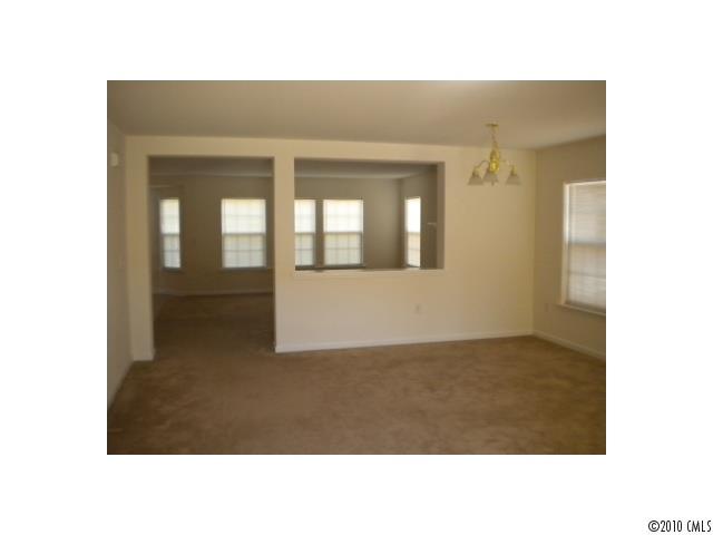 7809 Kuck Road Mint Hill, NC 28227 - Photo 6 of 10 a black and white photo of a living room