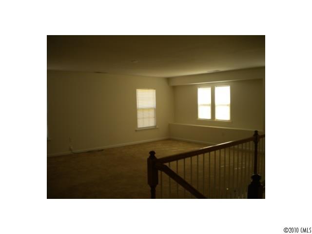 7809 Kuck Road Mint Hill, NC 28227 - Photo 7 of 10 a black and white photo of a living room