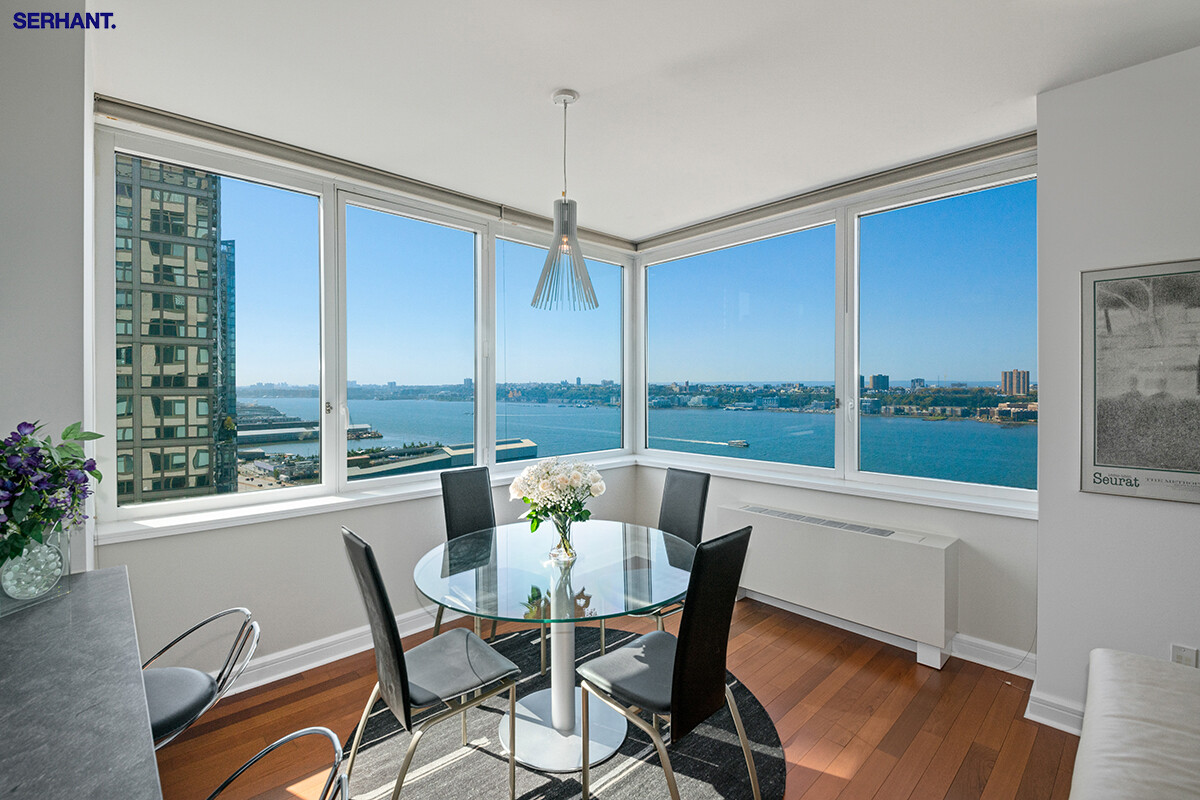 100 Riverside Boulevard, Unit 25D Manhattan, NY 10069 - Photo 3 of 21 a view of a dining room with furniture window and outside view
