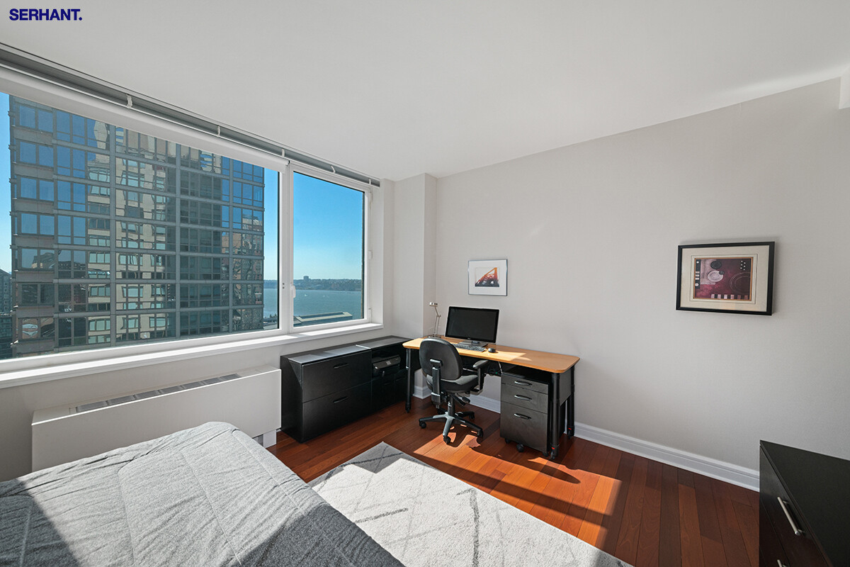 100 Riverside Boulevard, Unit 25D Manhattan, NY 10069 - Photo 7 of 21 a view of a workspace with a window