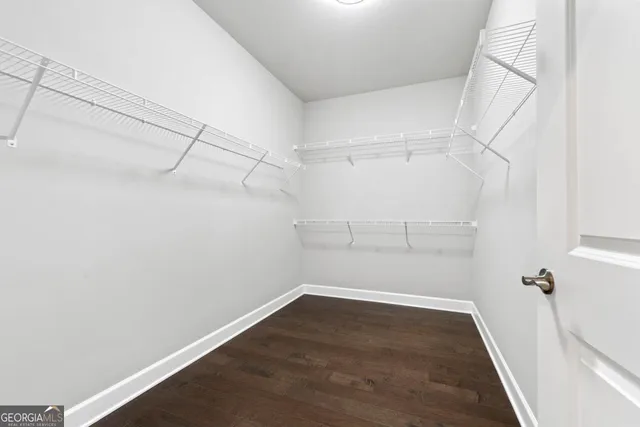 a bathroom with a sink double vanity and a mirror