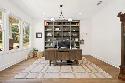 a view of a workspace with furniture