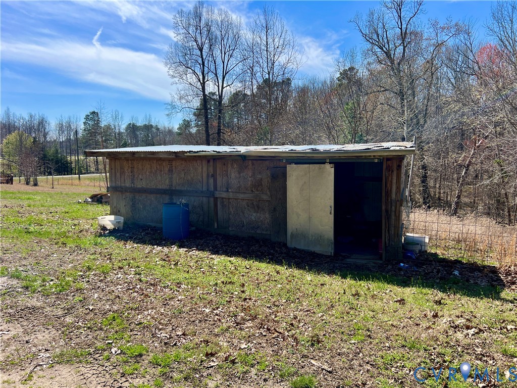 2049 Riddle Road Blackstone, VA 23824 - Photo 42 of 44 a wooden fence with a yard
