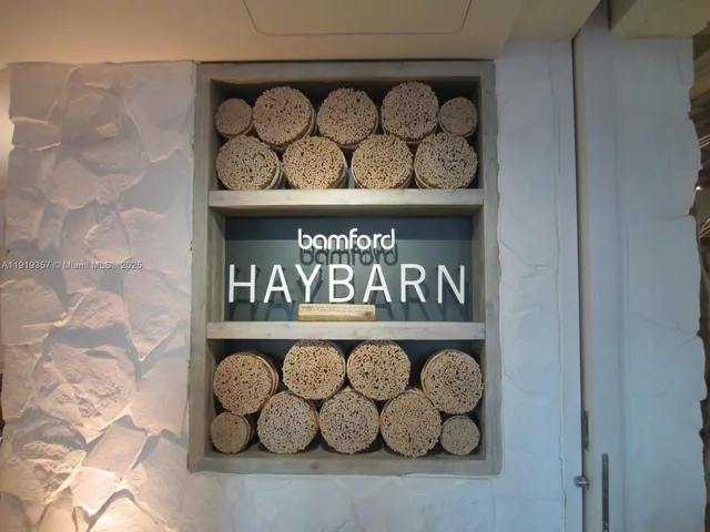 a wall with lots of wooden cabinets