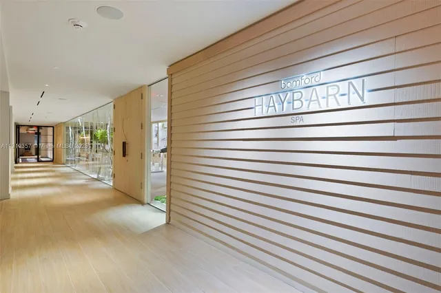 a room with furniture and a large window