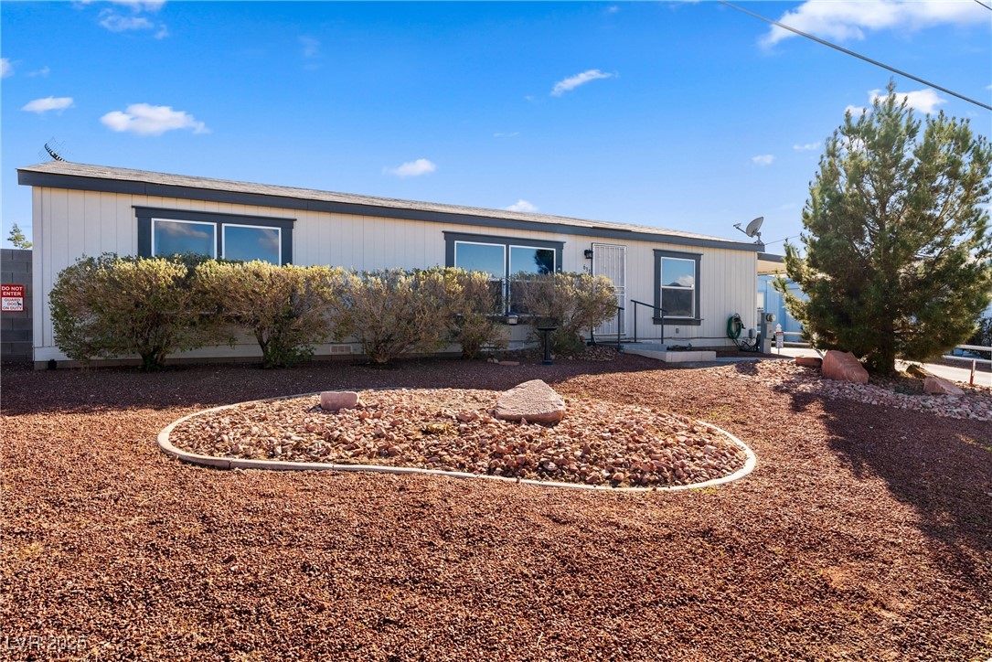 633 East Simkins Road Pahrump, NV 89060 - Photo 1 of 25 View of front of house