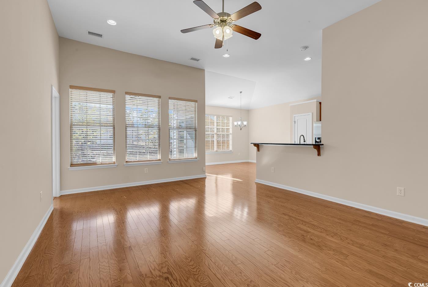 1612 Fairforest Court Conway, SC 29526 - Photo 7 of 40 Unfurnished living room featuring light wood-type flooring, a chandelier, ceiling fan, and recessed lighting