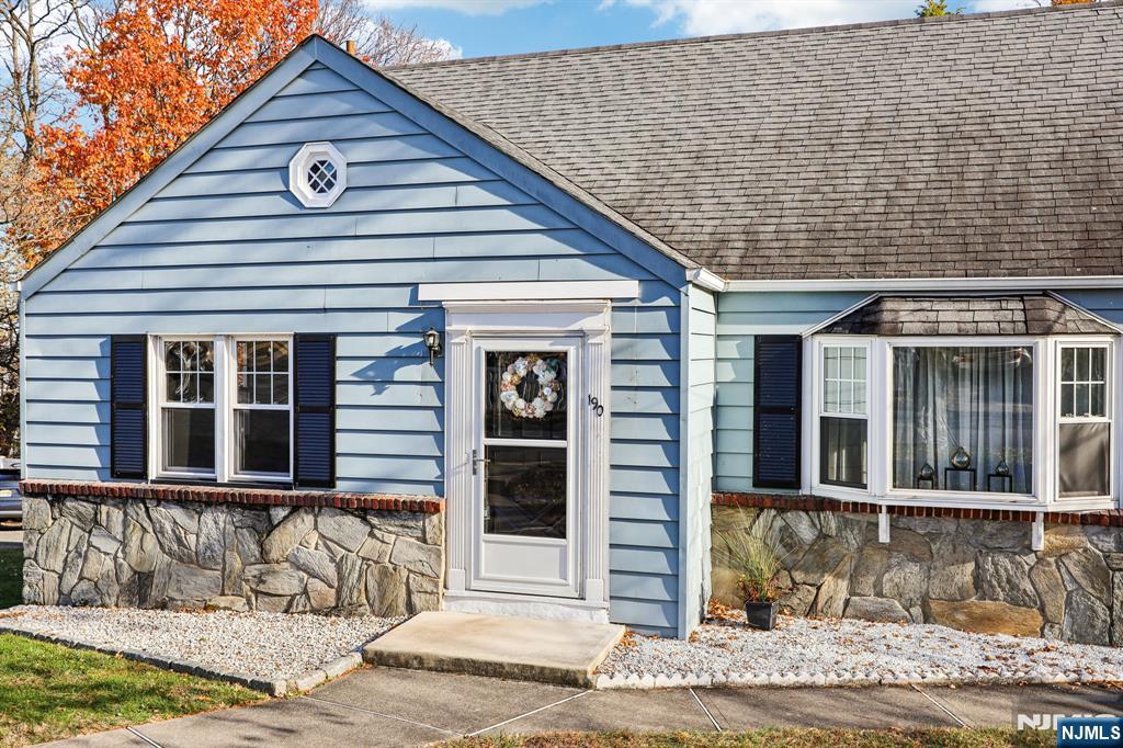 190 Bell Street Belleville, NJ 07109 - Photo 1 of 21 a front view of a house with a garden