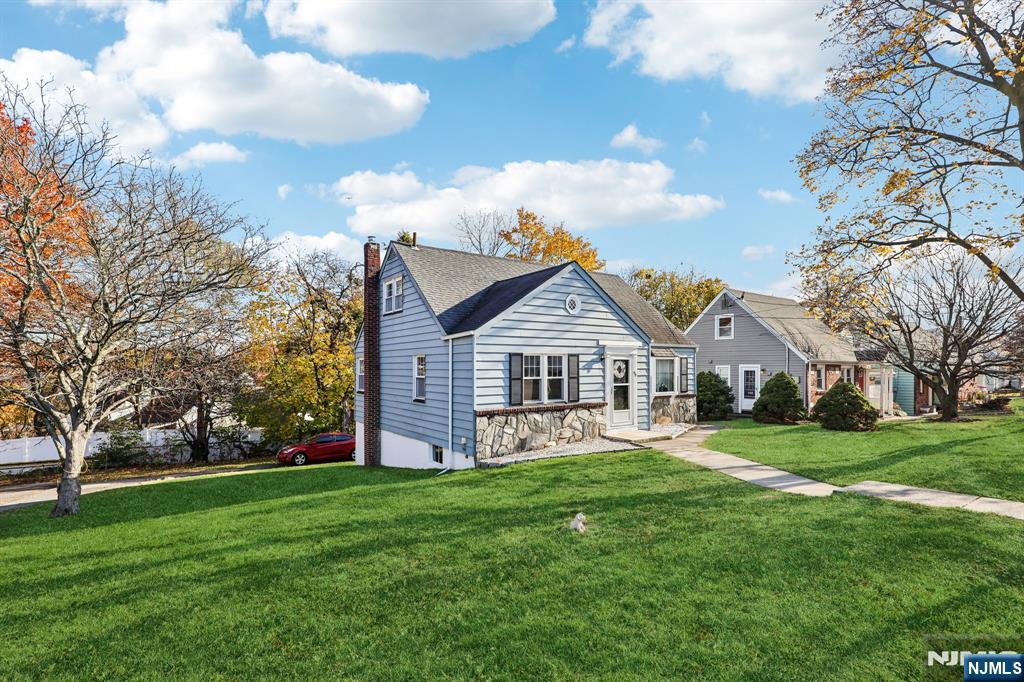 190 Bell Street Belleville, NJ 07109 - Photo 3 of 21 a front view of house with yard and green space