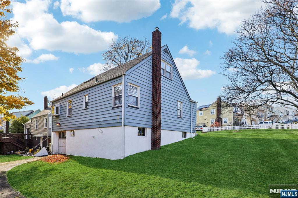 190 Bell Street Belleville, NJ 07109 - Photo 4 of 21 a view of a house with a yard