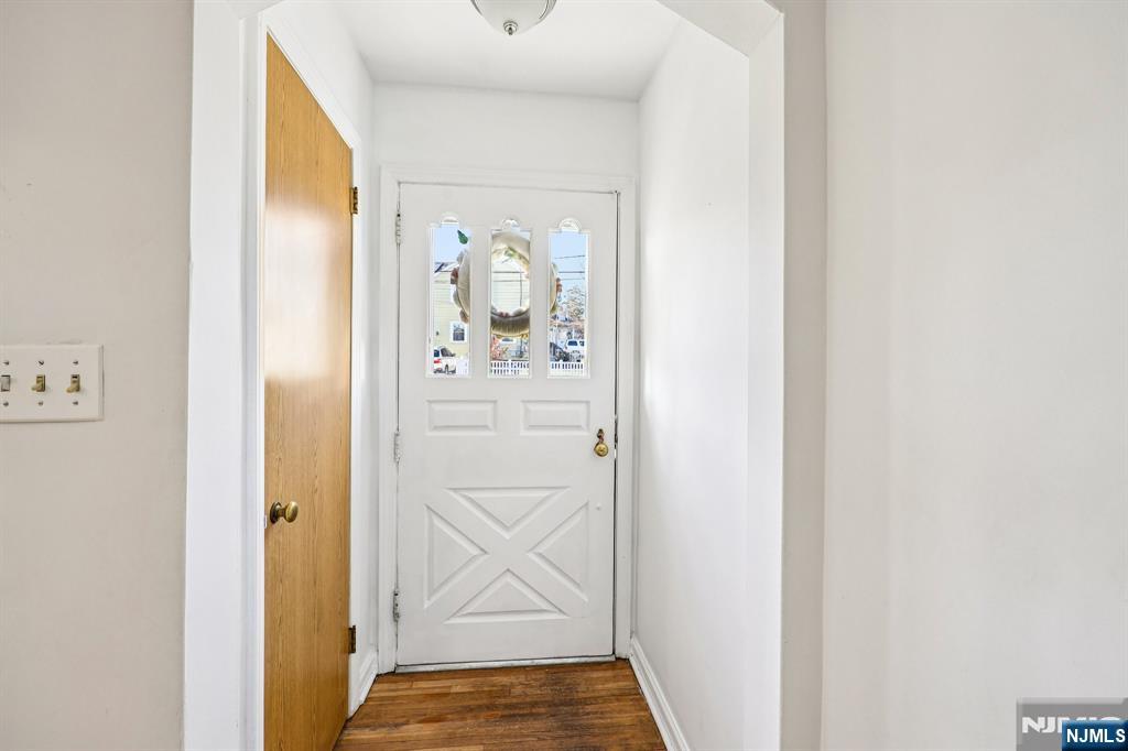 190 Bell Street Belleville, NJ 07109 - Photo 5 of 21 a view of front door with wooden floor