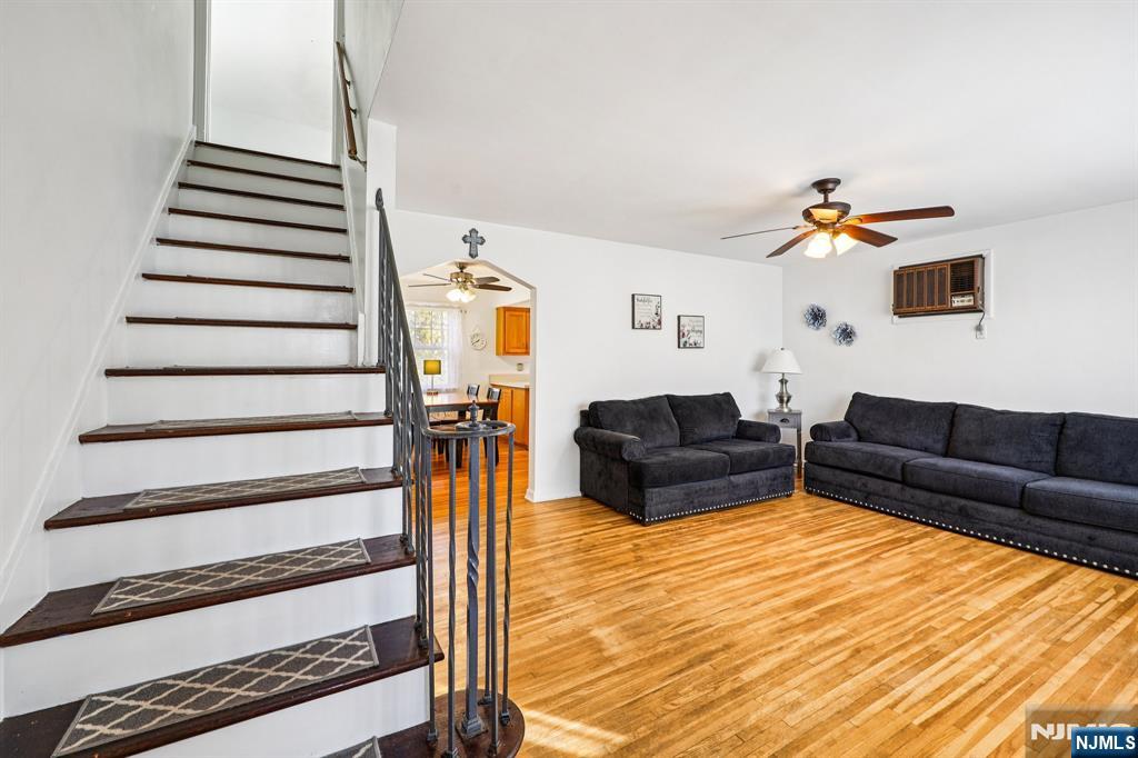 190 Bell Street Belleville, NJ 07109 - Photo 6 of 21 a living room with furniture and a wooden floor