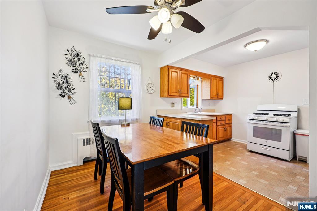 190 Bell Street Belleville, NJ 07109 - Photo 8 of 21 a view of a dining room with furniture and a chandelier