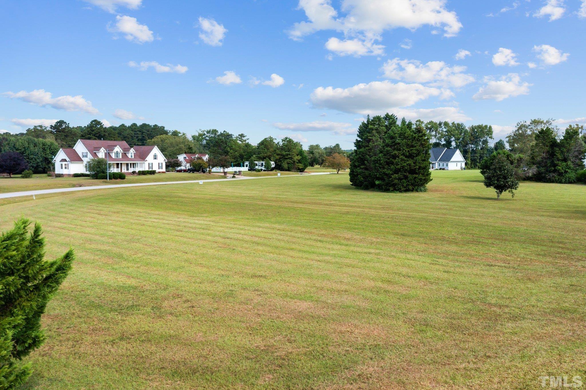84 Golf Course Drive Pinetops, NC 27864 - Photo 13 of 38 a view of an ocean and city