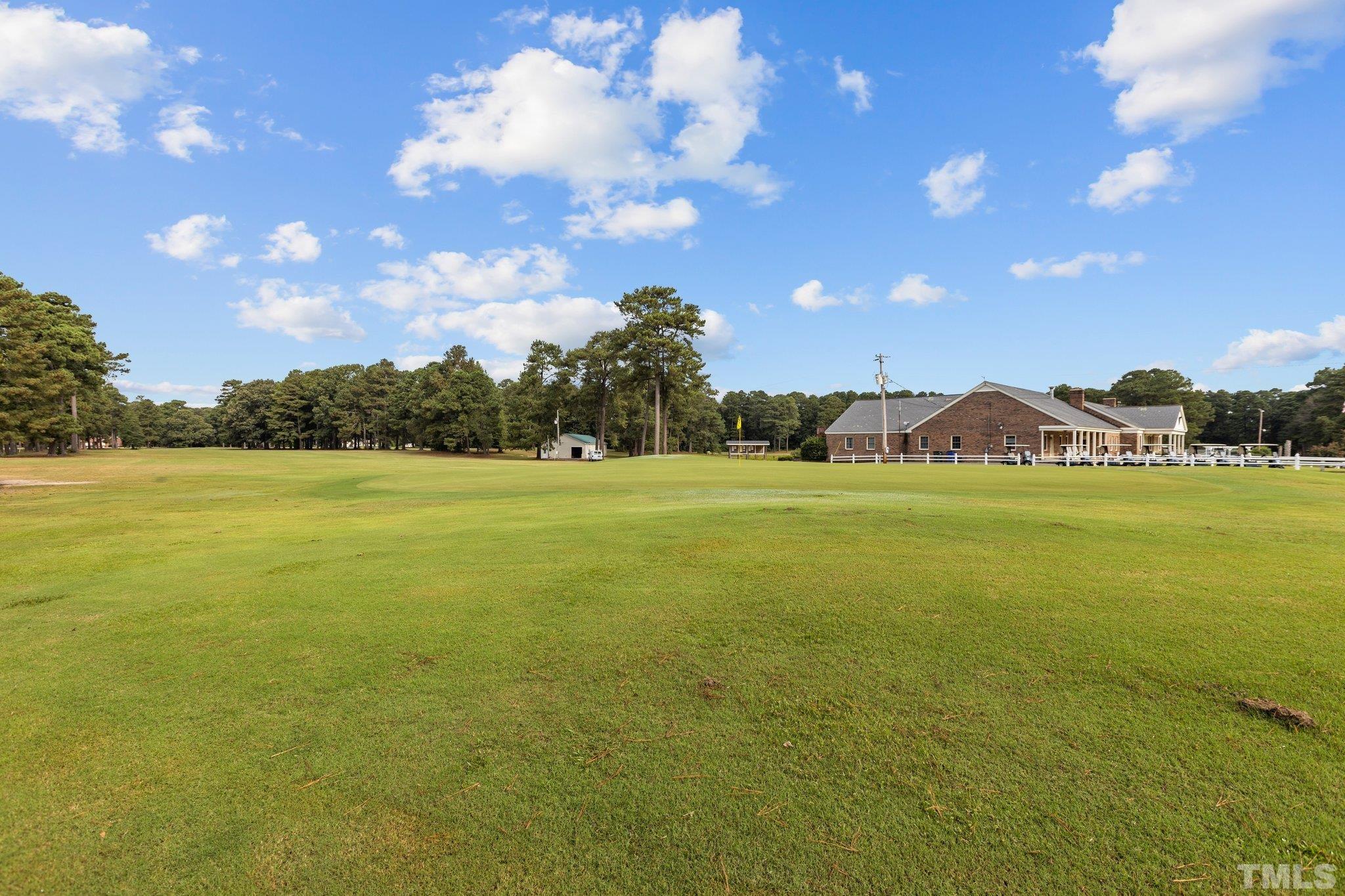 84 Golf Course Drive Pinetops, NC 27864 - Photo 27 of 38 a view of an ocean and a building