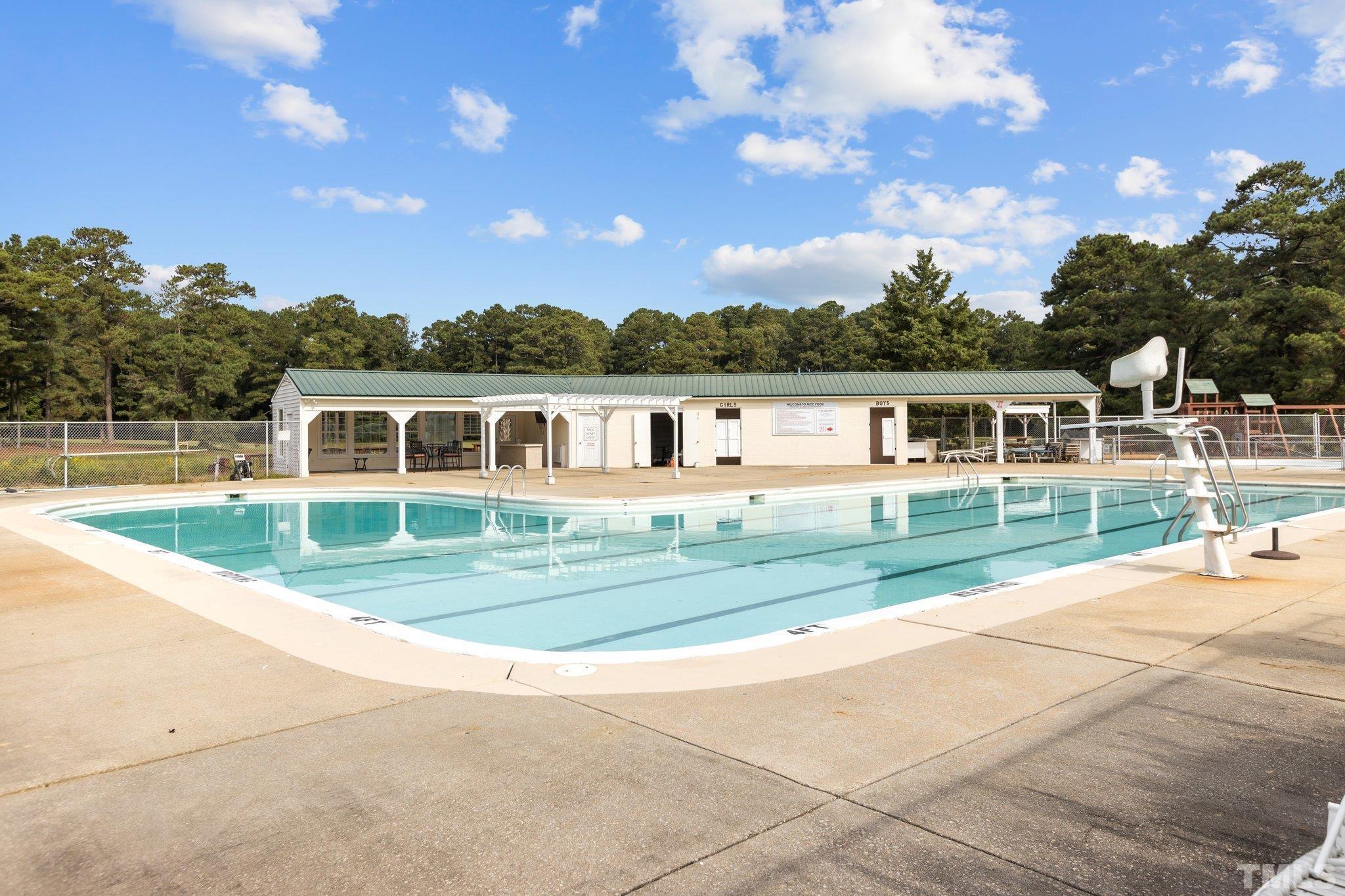 84 Golf Course Drive Pinetops, NC 27864 - Photo 31 of 38 front view of a house with a yard