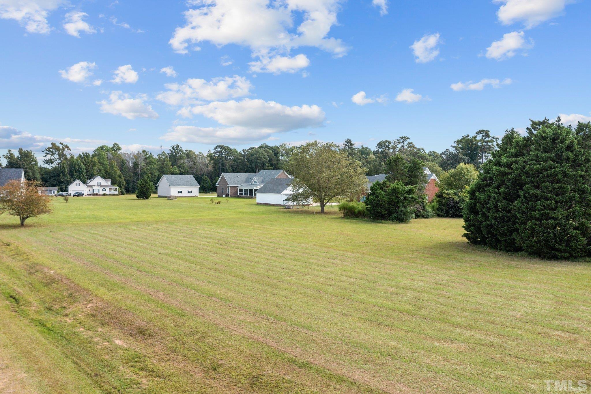 84 Golf Course Drive Pinetops, NC 27864 - Photo 8 of 38 a view of an ocean and beach