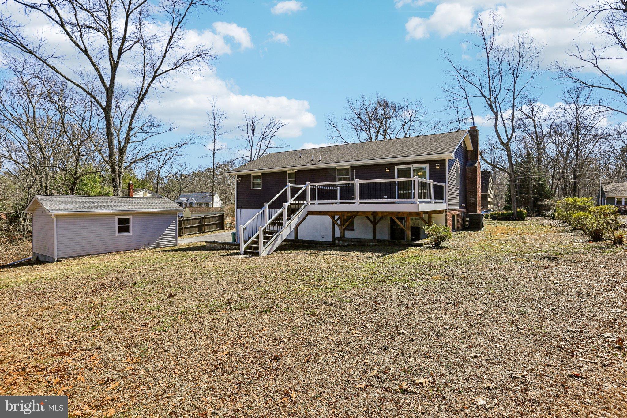 306 Christy Road Pasadena, MD 21122 - Photo 38 of 58 a house with trees in front of it