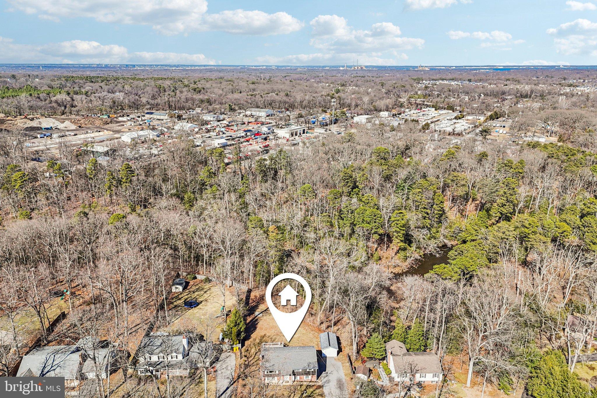 306 Christy Road Pasadena, MD 21122 - Photo 45 of 58 an aerial view of a house with yard and mountain view in back