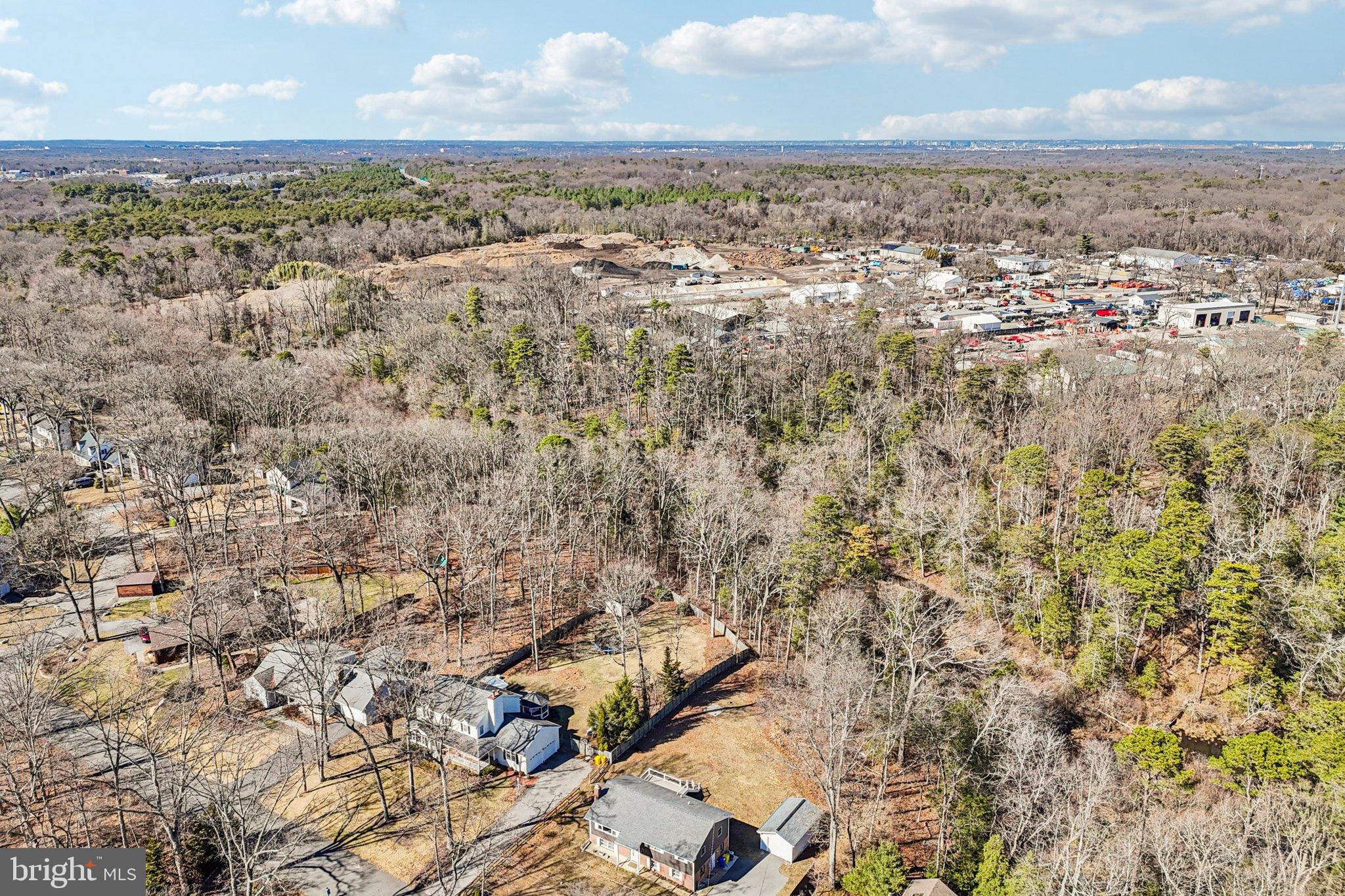 306 Christy Road Pasadena, MD 21122 - Photo 46 of 58 an aerial view of residential building and parking space