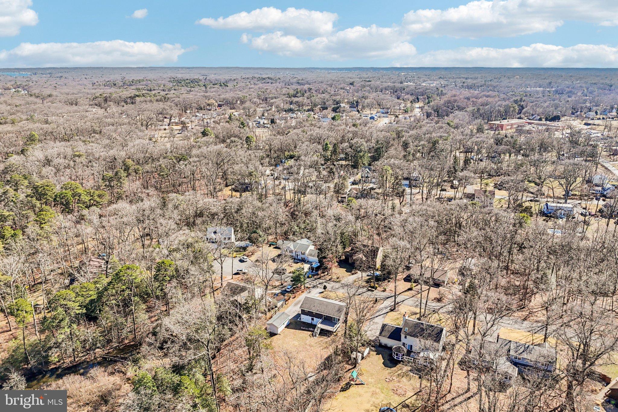 306 Christy Road Pasadena, MD 21122 - Photo 52 of 58 an aerial view of house with yard and covered with fog