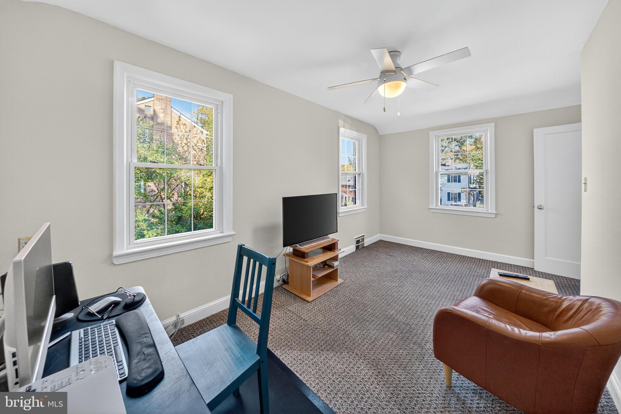 10018 Brookmoor Drive Silver Spring, MD 20901 - Photo 13 of 22 a living room with furniture and a window