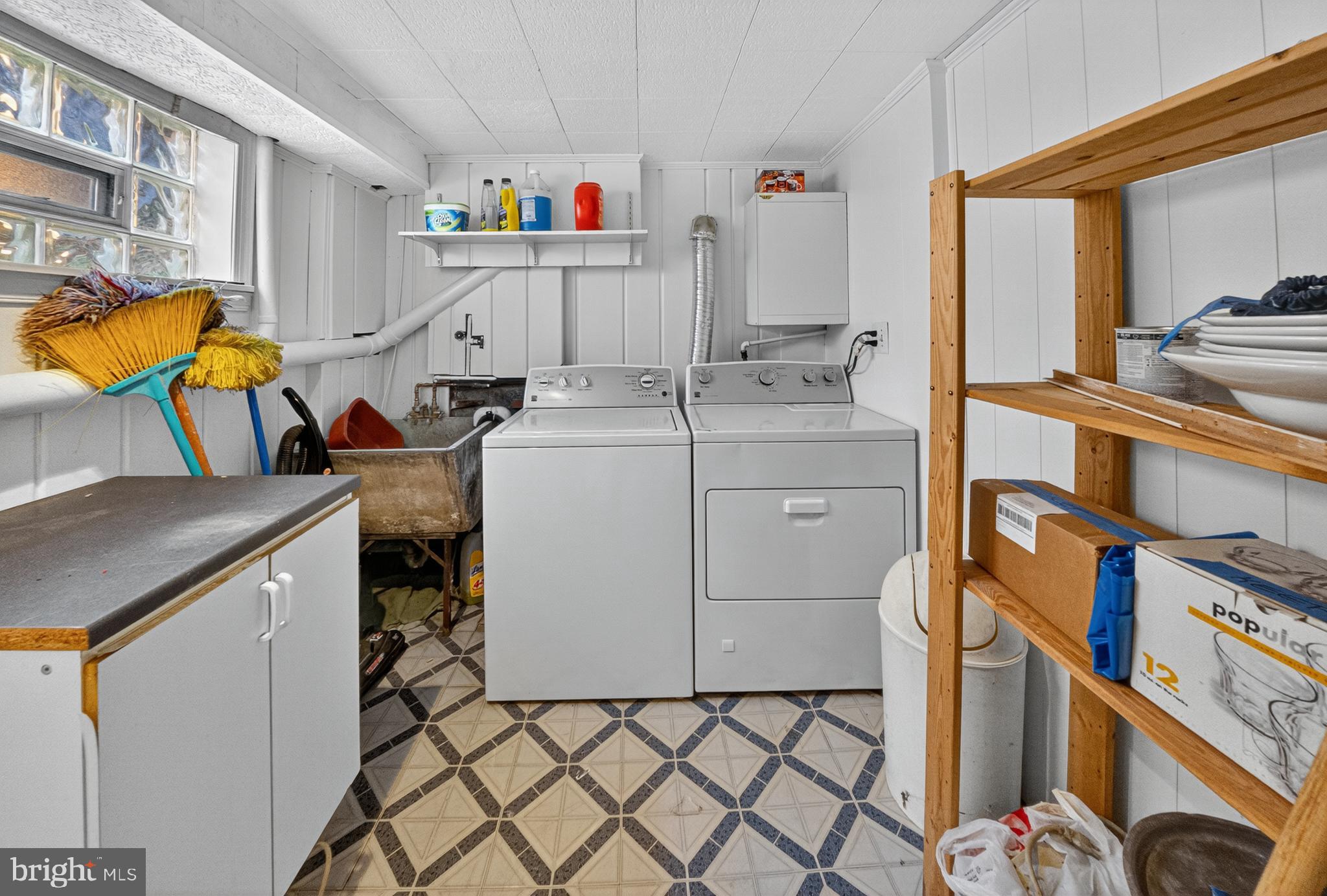 10018 Brookmoor Drive Silver Spring, MD 20901 - Photo 18 of 22 a utility room with dryer and washer