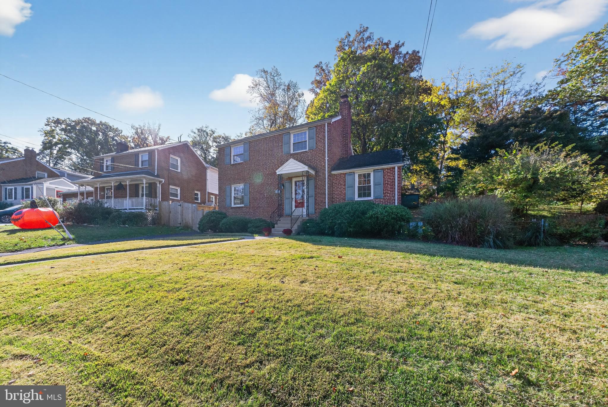 10018 Brookmoor Drive Silver Spring, MD 20901 - Photo 20 of 22 a view of a house with a yard
