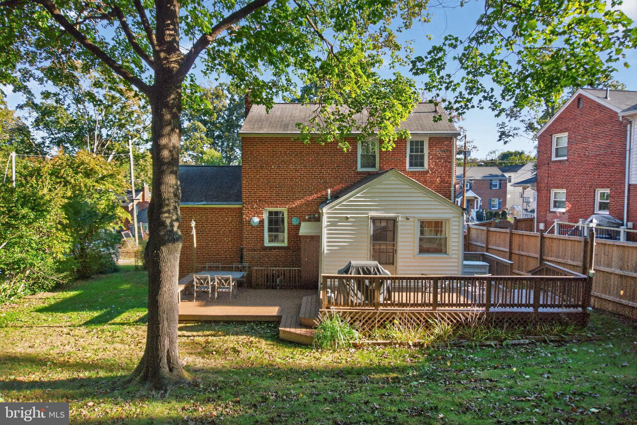 10018 Brookmoor Drive Silver Spring, MD 20901 - Photo 22 of 22 a front view of a house with garden