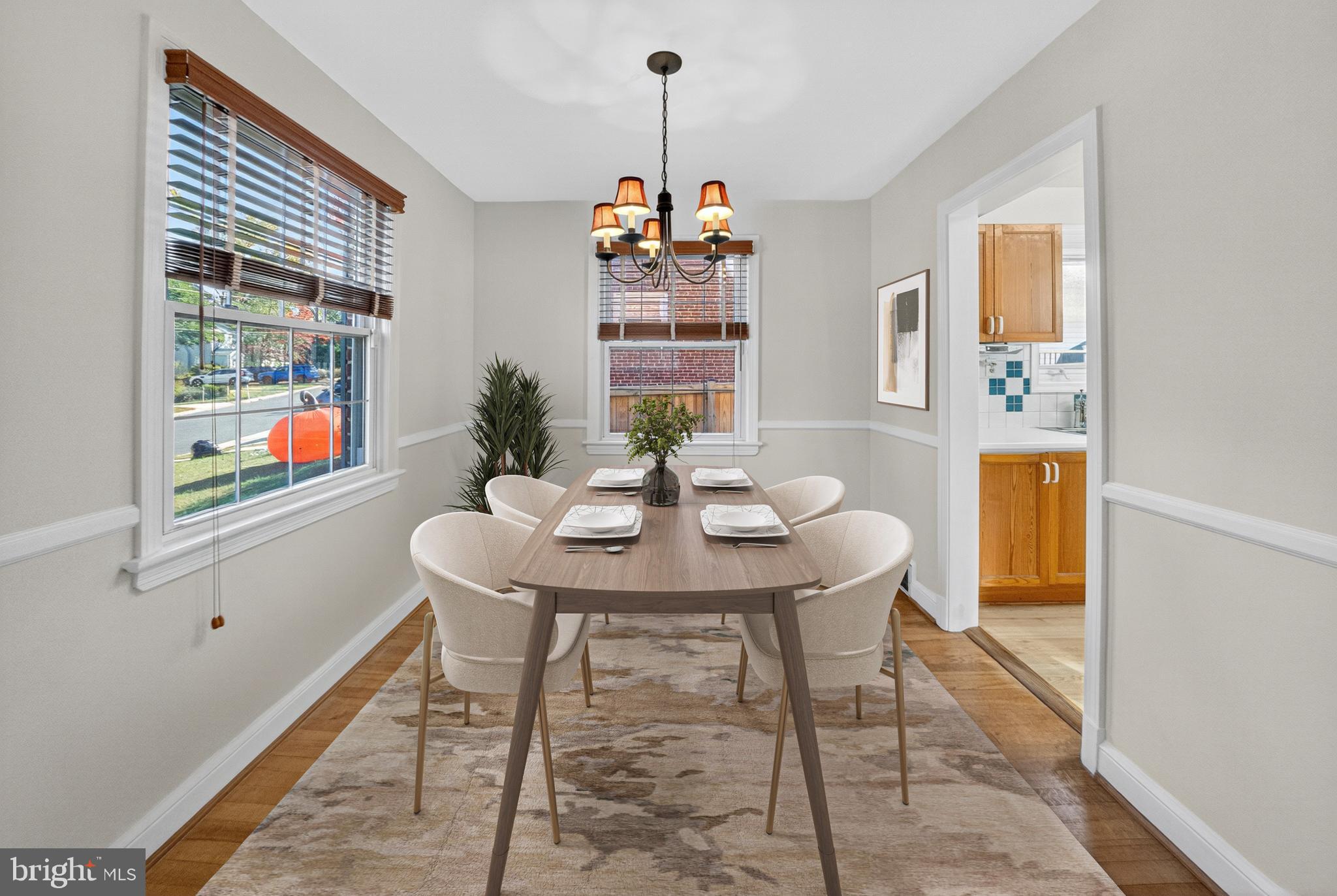 10018 Brookmoor Drive Silver Spring, MD 20901 - Photo 5 of 22 a view of a dining room with furniture window and wooden floor