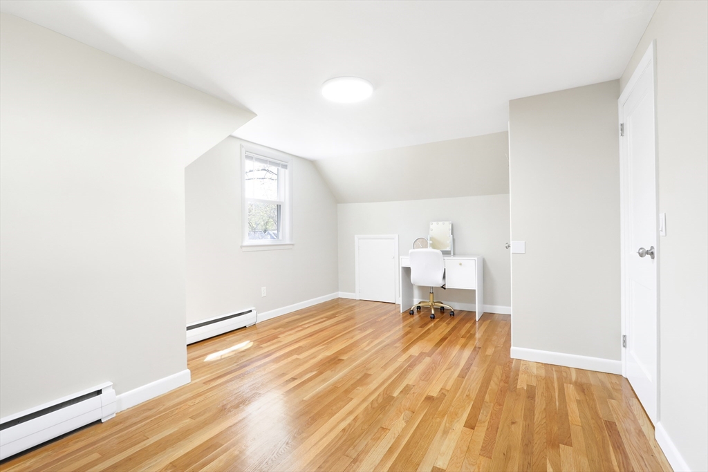 15 Davidson Road Framingham, MA 01701 - Photo 15 of 33 a bedroom with a bed and a window