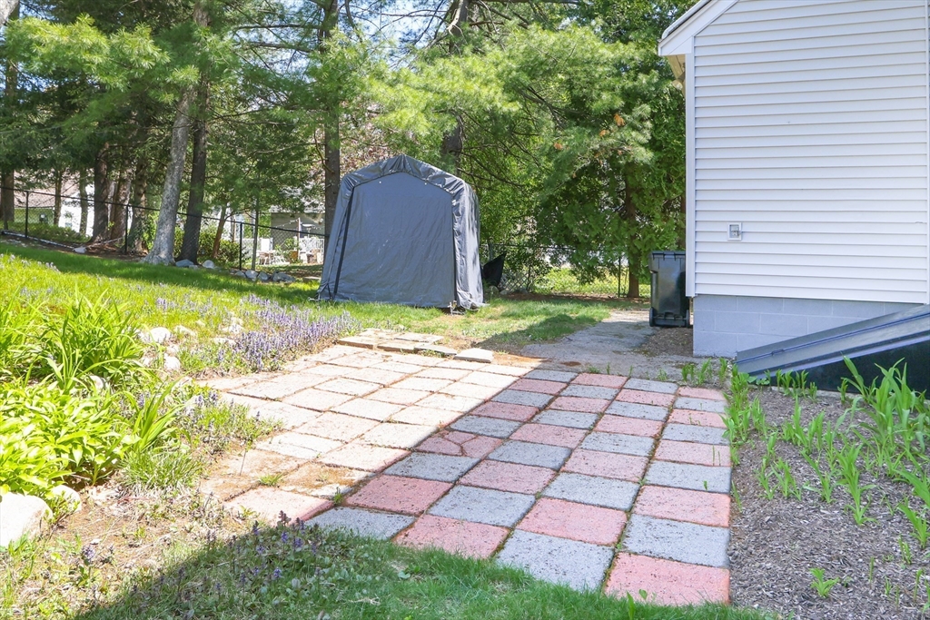 15 Davidson Road Framingham, MA 01701 - Photo 31 of 33 a view of a backyard with large trees