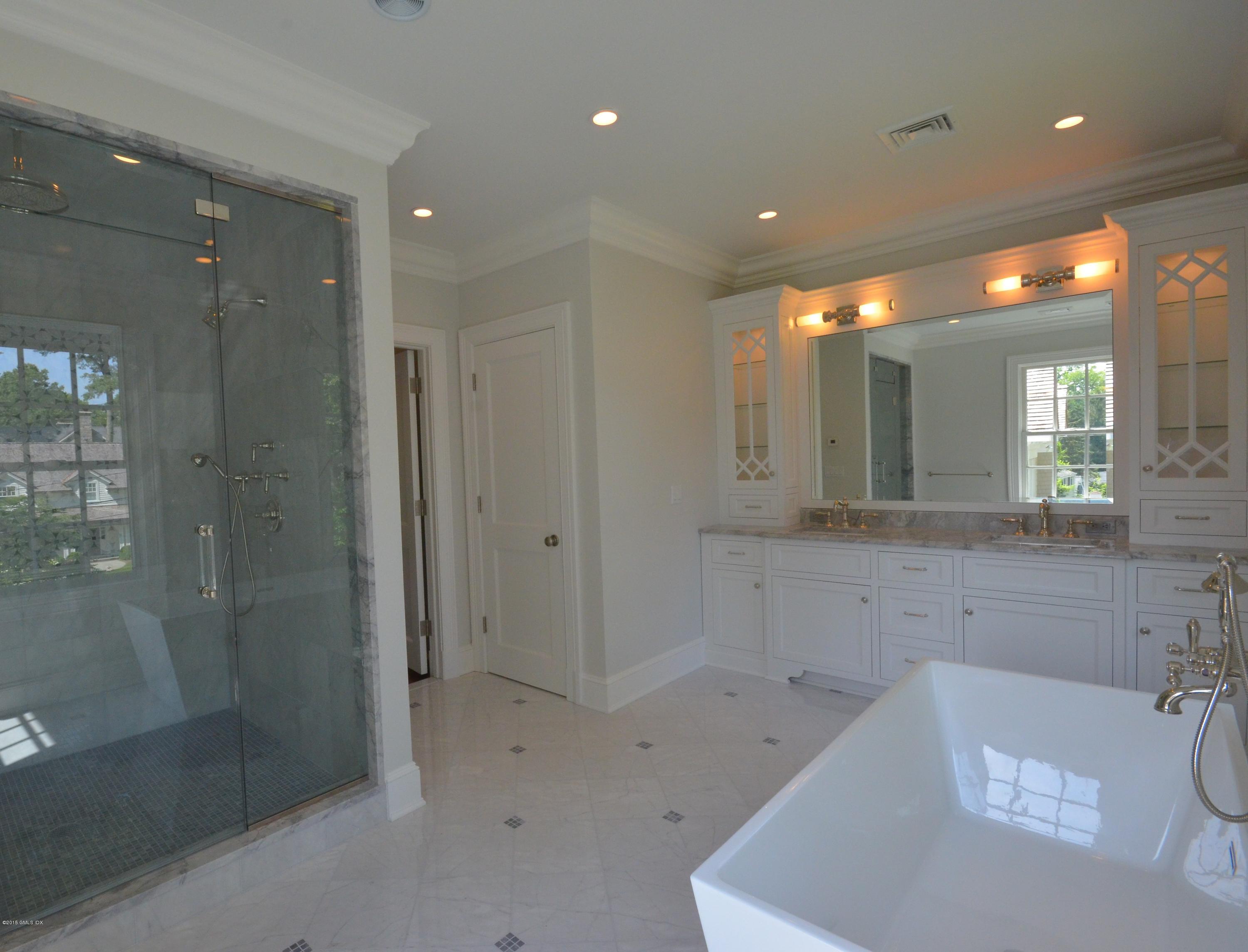 29 Winthrop Drive Riverside, CT 06878 - Photo 8 of 9 a bathroom with a bathtub and a sink