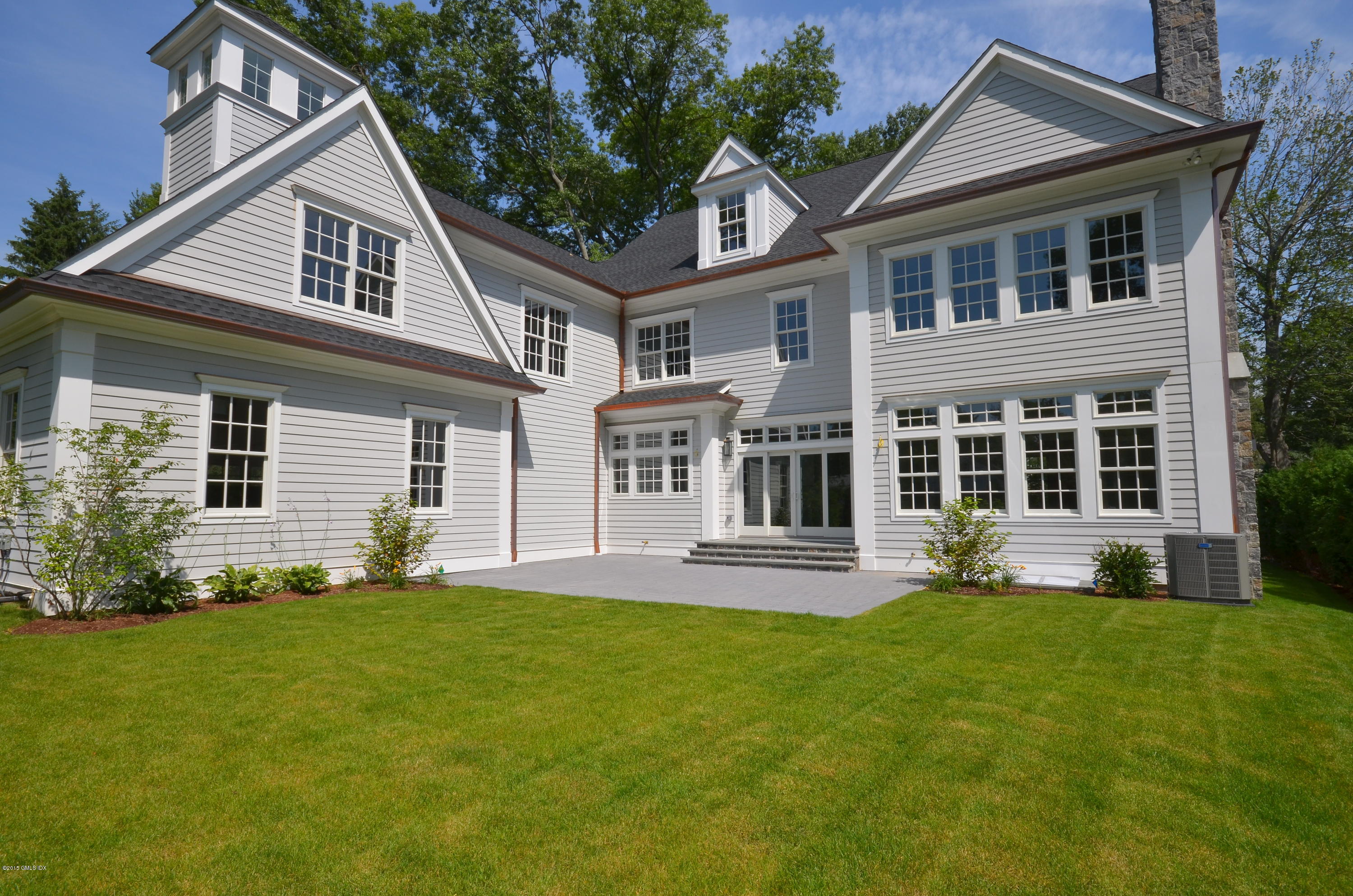 29 Winthrop Drive Riverside, CT 06878 - Photo 9 of 9 a front view of house with yard and green space