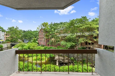 a view of a couple of street from a balcony