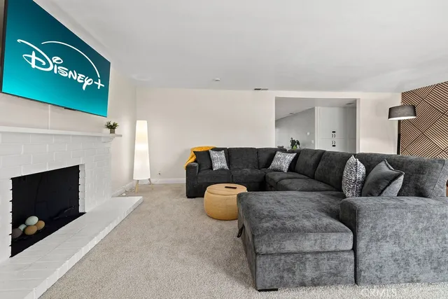 a living room with a couch and a table