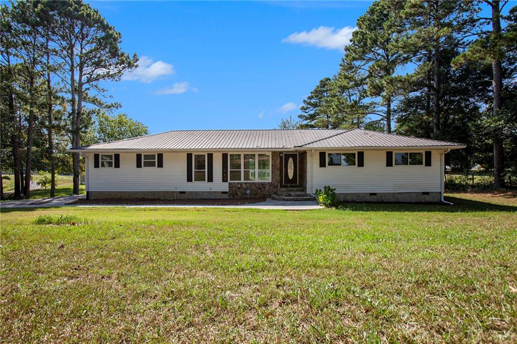 240 Cook Road Northwest Resaca, GA 30735 - Photo 1 of 1 a view of a house with a yard