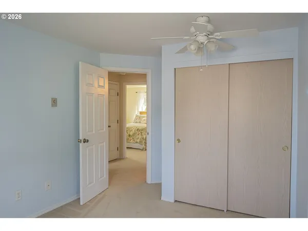 a view of a room with a hallway