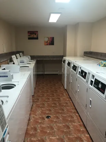 a kitchen with a stove and a sink