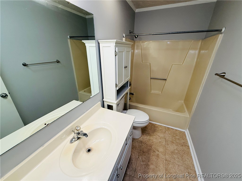 5901 Rehoboth Road Hope Mills, NC 28348 - Photo 18 of 22 a bathroom with a sink and a shower