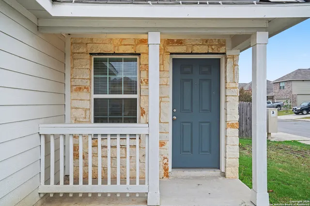 a view of a porch with a door