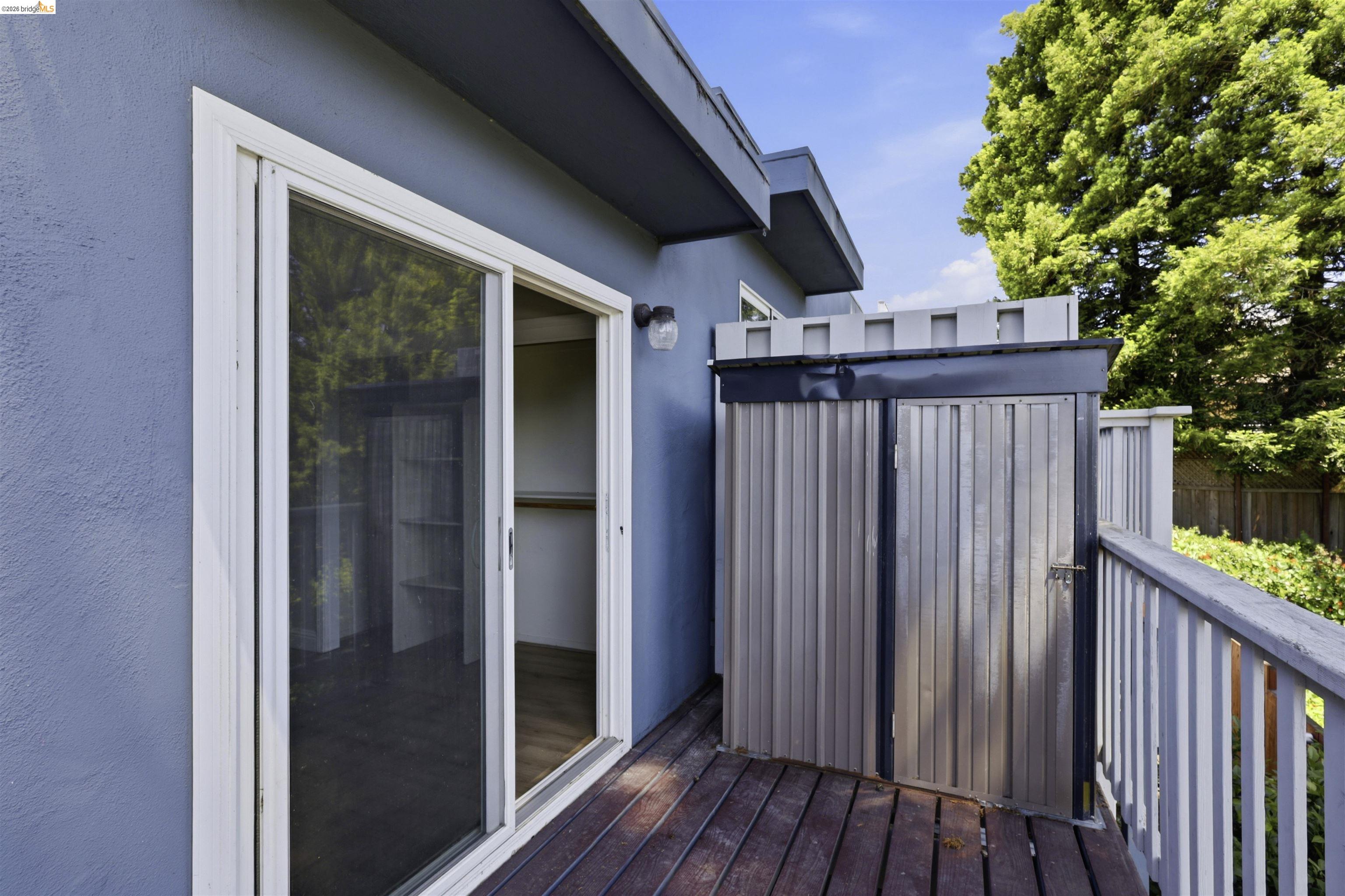 7555 Sunset Way, Unit 6 Aptos, CA 95003 - Photo 30 of 37 Outdoor balcony featuring wood decking and a sliding glass door