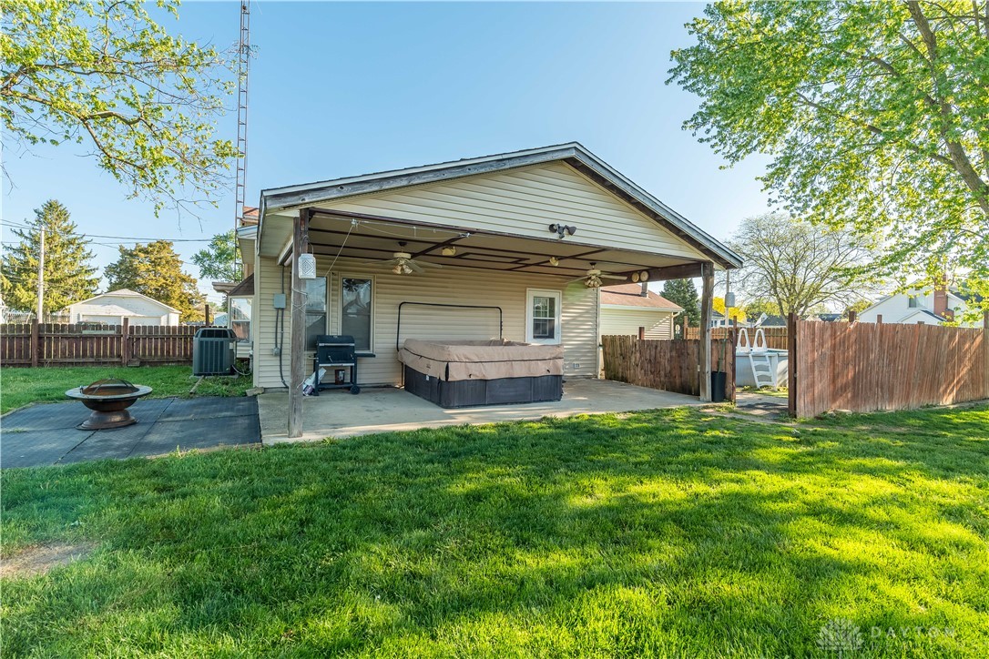 220 Racer Street Troy, OH 45373 - Photo 27 of 33 This inviting backyard features a spacious covered patio perfect for outdoor relaxation.
