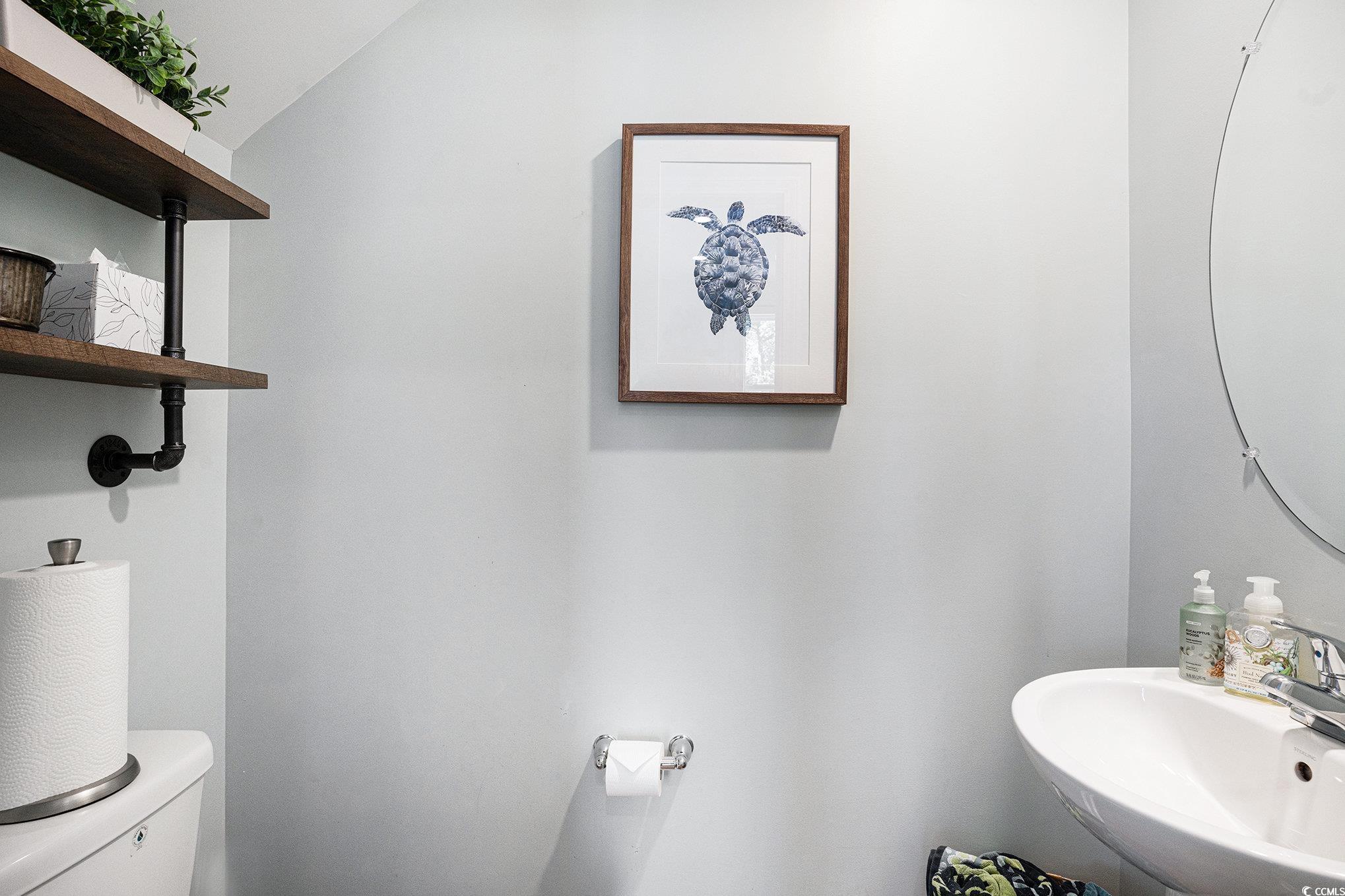 4754 Cloisters Lane Myrtle Beach, SC 29577 - Photo 11 of 32 Bathroom with a sink and toilet