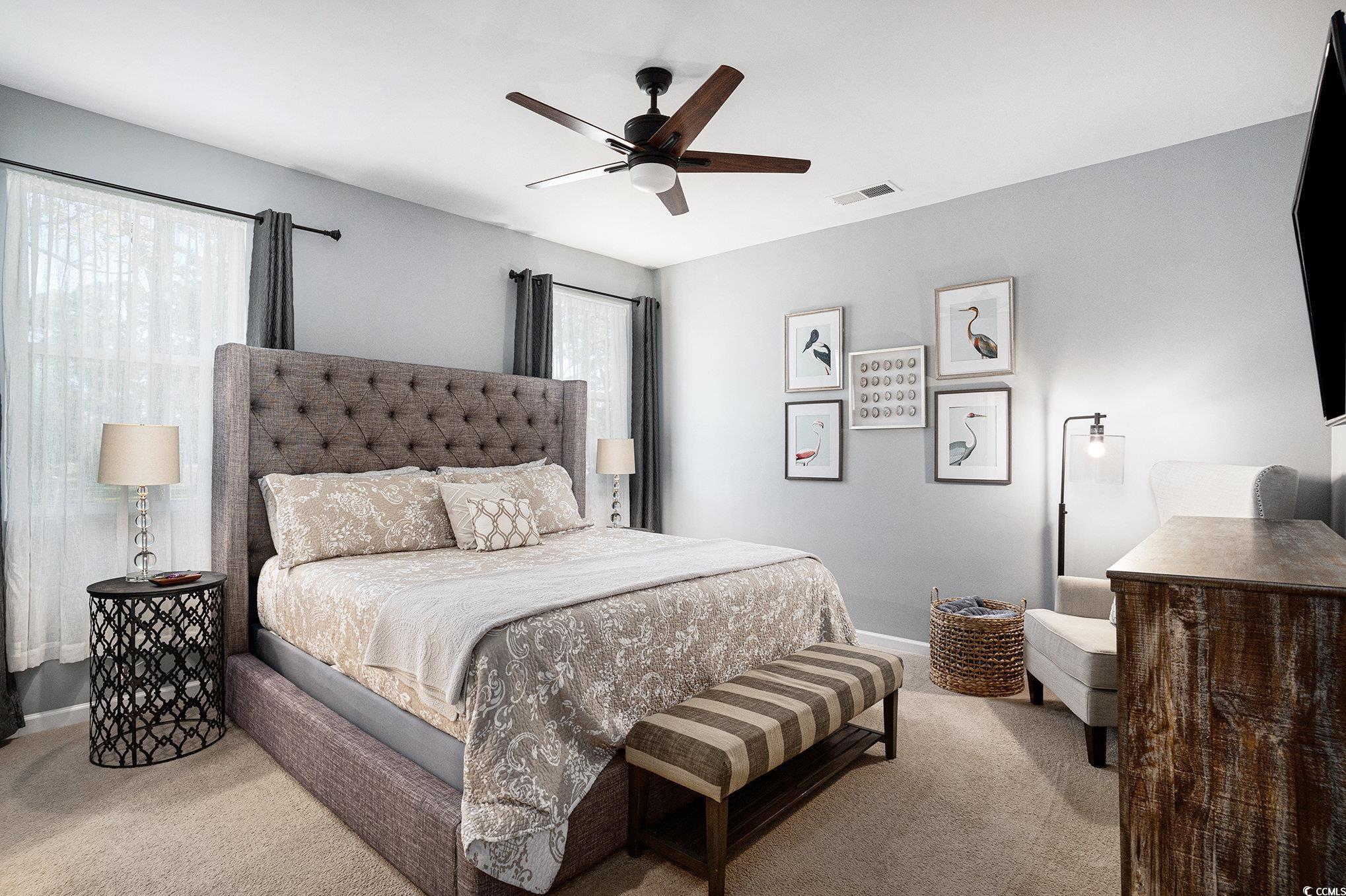 4754 Cloisters Lane Myrtle Beach, SC 29577 - Photo 12 of 32 Bedroom with carpet and a ceiling fan