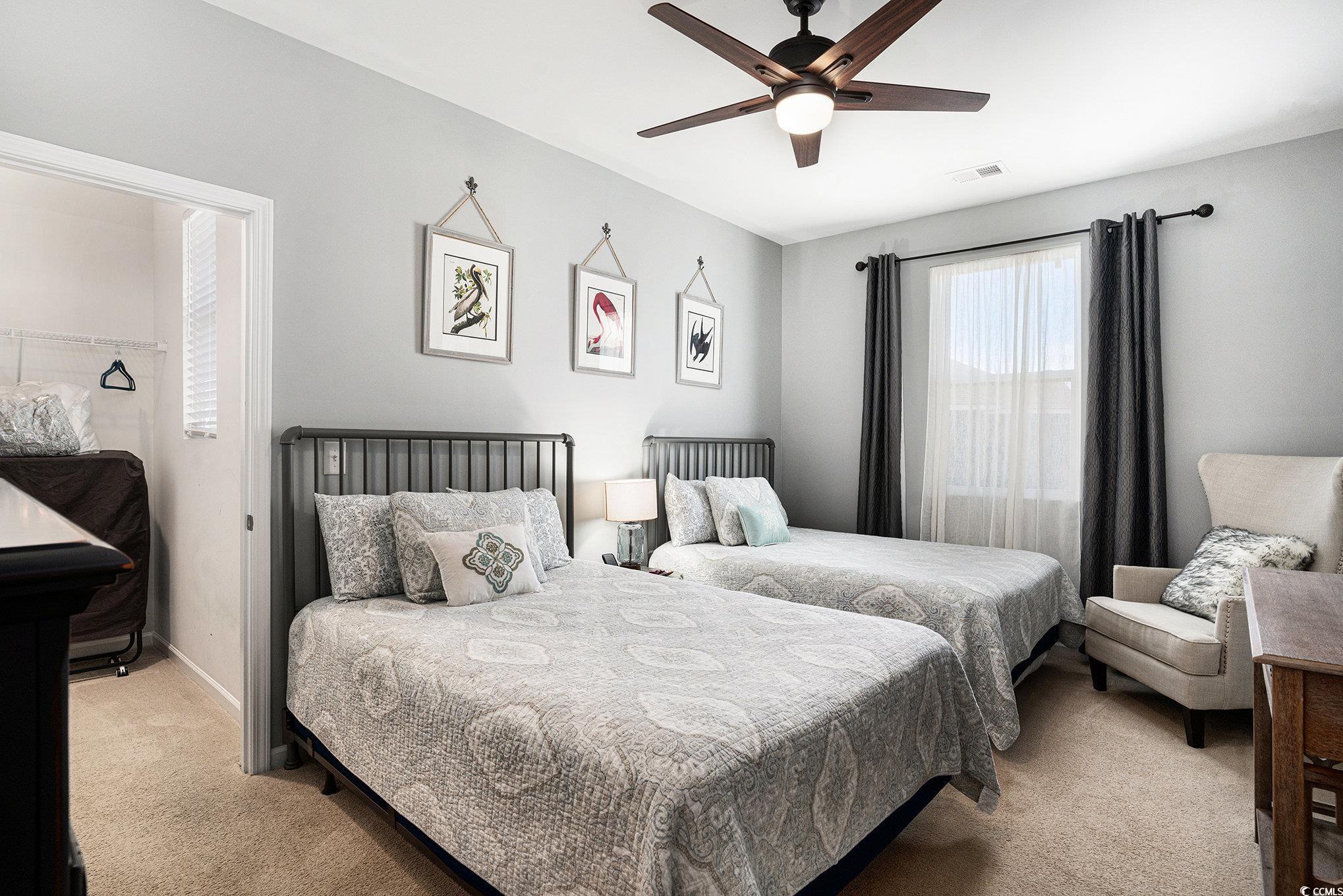 4754 Cloisters Lane Myrtle Beach, SC 29577 - Photo 19 of 32 Carpeted bedroom with ceiling fan and baseboards