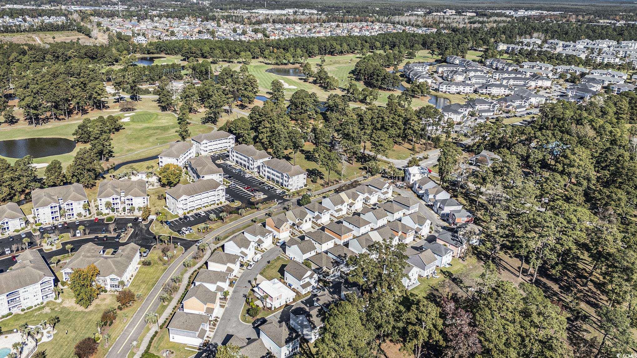 4754 Cloisters Lane Myrtle Beach, SC 29577 - Photo 30 of 32 Aerial overview of property's location featuring nearby suburban area, a nearby body of water, and a local golf course